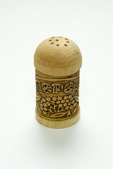 Wooden pepperbox isolated on white background