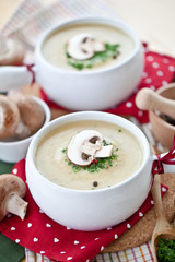 Two bowls of fresh mushroom soup