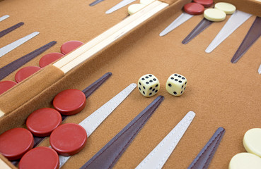 Dice and pieces of backgammon game