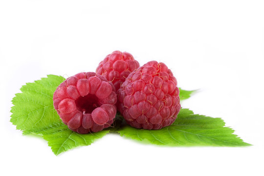 raspberries with leaf isolated on white