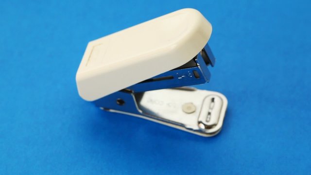 small white stapler rotates alone
