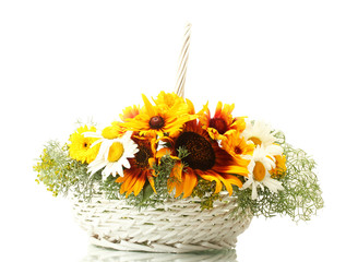 Naklejka premium beautiful bouquet of bright wildflowers in basket, isolated