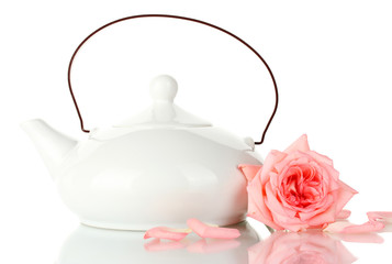 teapot of tea with rose isolated on white