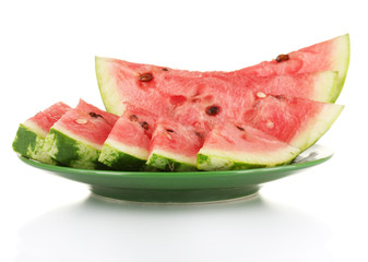 Slices of watermelon on the plate isolated on white