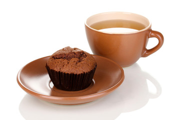 Fresh muffin with tea isolated on white
