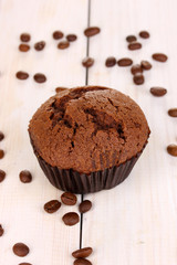 Fresh muffin on wooden background