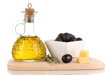 Black olives in white bowl with rosemary,olive oil and cheese