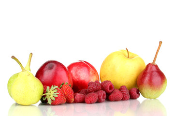 Mix of ripe sweet fruits and berries isolated on white