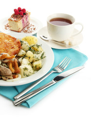 Roast chicken cutlet with boiled potatoes and  vegetables, cup