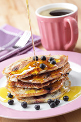 Blueberry pancakes with honey