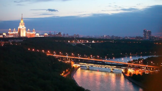 Luzhnetsky bridge stands against Moscow State university