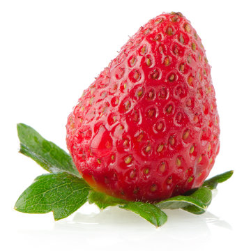 Fresh strawberry on a white reflective background.