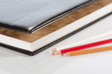 Photo album and color pencils