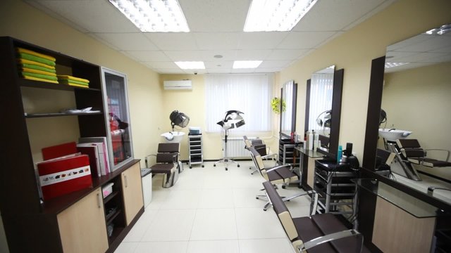 Flying motion of camera in salon hairdressing salon around room