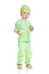 Cute baby eats the bread