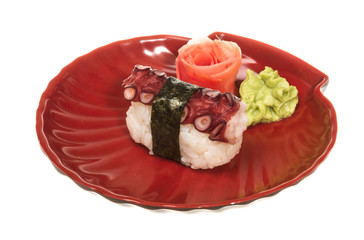 Japanese sushi with meat octopus on a white background
