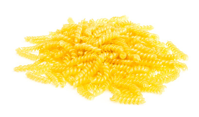 pile of fusilli pasta close up on wood background