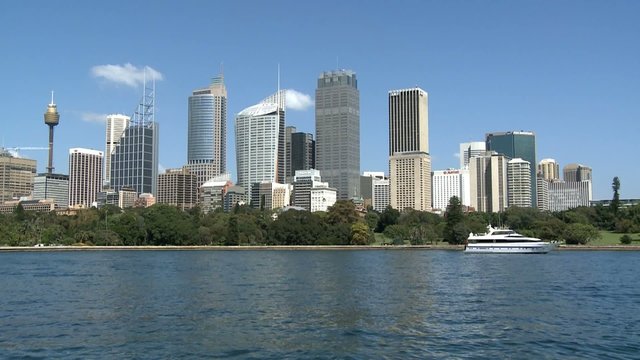 Skyline of Sydney with Waterfront of Harbor Bay and a Boat