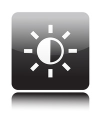 Sun icon on black button