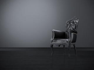 Vintage black chair in the dark room