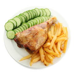 Roast chicken with french fries and cucumbers