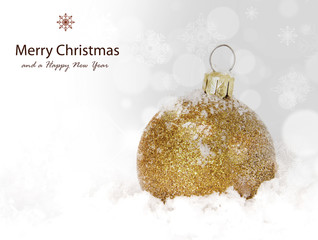 Gold christmas balls with snow