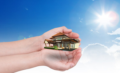Fototapeta premium Hand holding new house