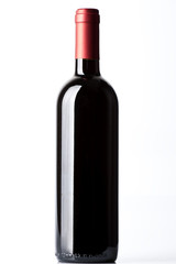 A red wine bottle on the white background