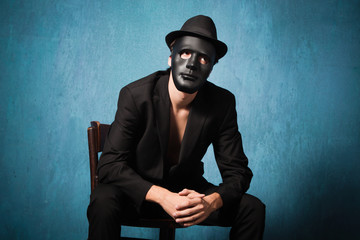man with black mask
