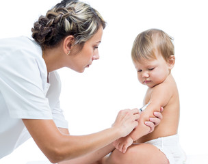 doctor vaccinating  baby isplated on a white background