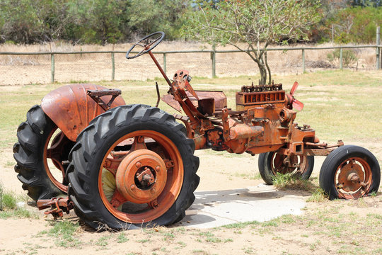 Very old red tractor