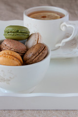 Still life with tea and macaroons