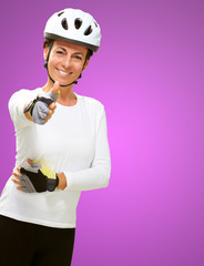 Woman Wearing Helmet Showing Thumb Up