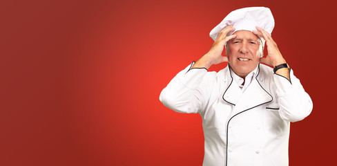 Portrait Of A Chef Having Headache