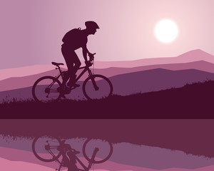 Fototapeta na wymiar cyclist silhouette at sunrise