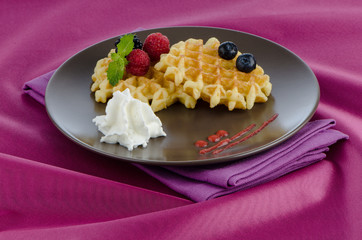 Tasty waffle with fruits