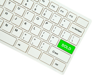 Wording Sold on computer keyboard isolated on white background