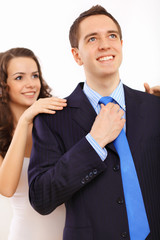 Businessman dressing at home in the morning