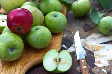 Fresh apples on wooden background. Selective focus