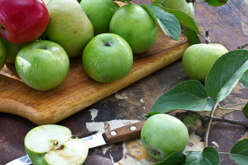 Fresh apples on vintage wooden background