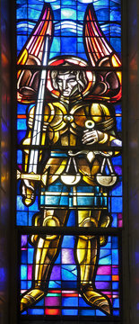 Brussels - Archangel Michael from windowpane of Basilica