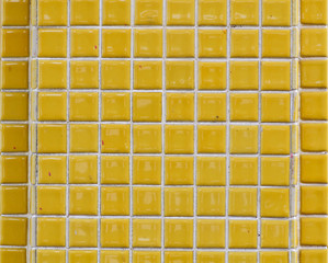 Square yellow brick wall