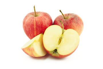 Naklejka na ściany i meble Two red apples, half and a slice