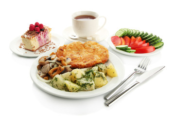 Roast chicken cutlet with boiled potatoes and  vegetables, cup