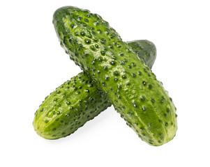 two green cucumbers with pimples