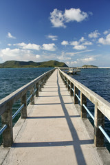 Obraz premium concrete jetty with railing over sea