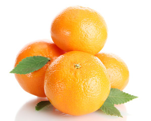ripe tangerines with leaves isolated on white
