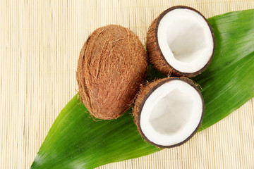 coconuts on a beige wicker mst close-up