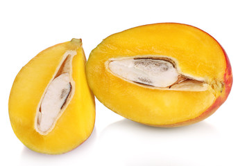 Ripe appetizing mango isolated on white