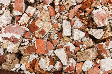 A pile of old broken red bricks